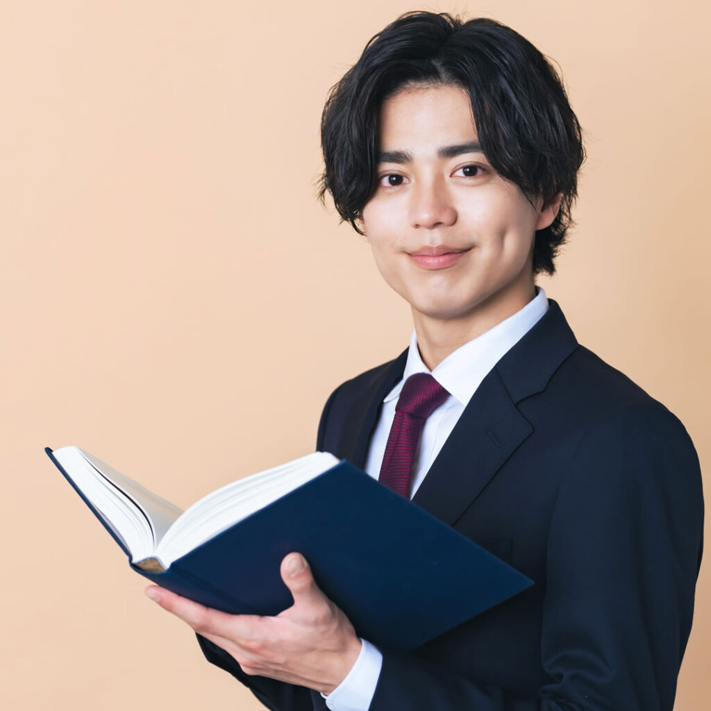 固定報酬が担保する「付加価値」の正体を説明する男性